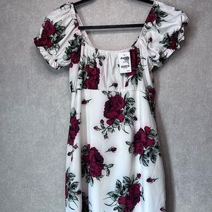 Rose covered Charlotte Russe dress. Size small. Tags still attached